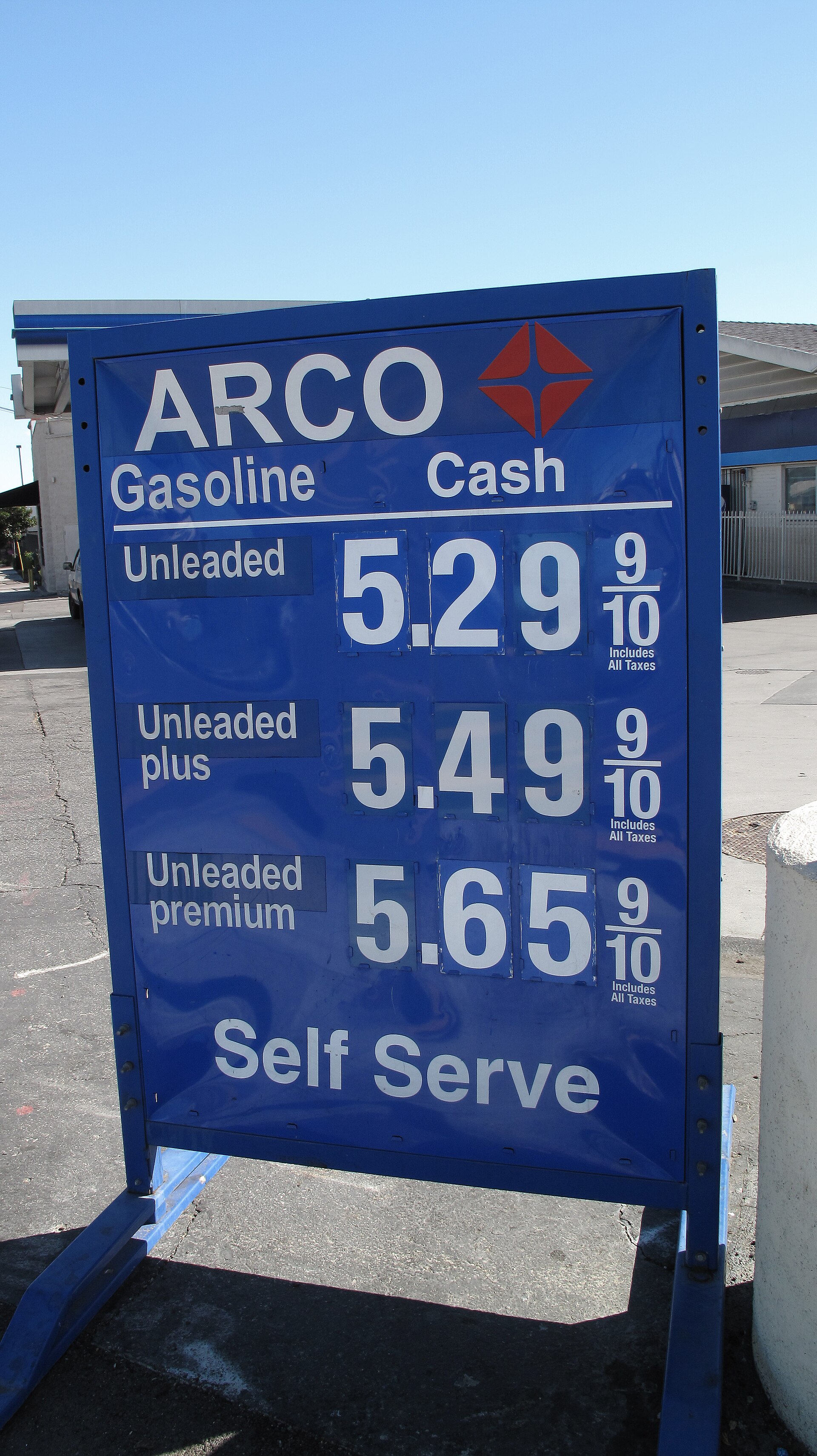 An Arco station price sign in Los Angeles, the per-gallon prices stacked in tall red digits